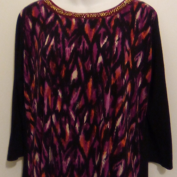 Asymmetrical Top With Accent Beads and Shark Bite Hem - Picture 2 of 10